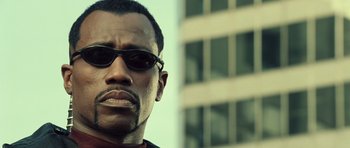 Movie still from “Blade: Trinity” (2004), directed by David S. Goyer – A person wearing sunglasses; Close Up shot, Low angle