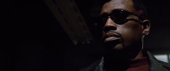 Movie still from “Blade: Trinity” (2004), directed by David S. Goyer – A person wearing a leather jacket; Close Up shot, Low angle
