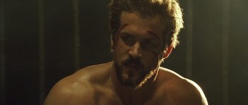 Movie still from “Blade: Trinity” (2004), directed by David S. Goyer – A person with blood on his face; Close Up shot, Over the shoulder angle