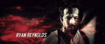 Movie still from “Blade: Trinity” (2004), directed by David S. Goyer – A person wearing a shirt and suspenders; Close Up shot, Overhead angle