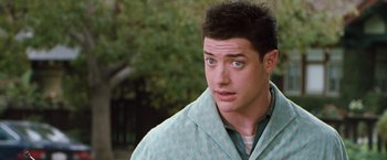 Movie still from “Blast from the Past” (1999), directed by Hugh Wilson – A person wearing a jacket; Close Up shot, Over the shoulder angle