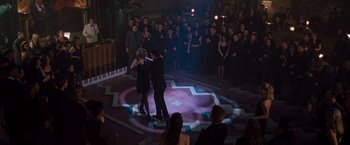 Movie still from “Blast from the Past” (1999), directed by Hugh Wilson – A couple of people that are dancing in a room; Extreme Wide shot, High angle