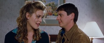 Movie still from “Blast from the Past” (1999), directed by Hugh Wilson – A man and a woman looking at one another; Close Up shot, Over the shoulder angle