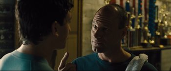 Movie still from “Bleed for This” (2016), directed by Ben Younger – A man and a woman talking to each other; Close Up shot, Over the shoulder angle