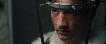 Movie still from “Bleed for This” (2016), directed by Ben Younger – A person with a helmet on; Close Up shot, High angle