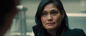 Movie still from “Bleed for This” (2016), directed by Ben Younger – A person with long black hair; Close Up shot, Over the shoulder angle