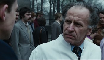 Movie still from “Blind Chance” (1987), directed by Krzysztof Kieslowski – An older man in a white shirt and a tie; Close Up shot, Low angle