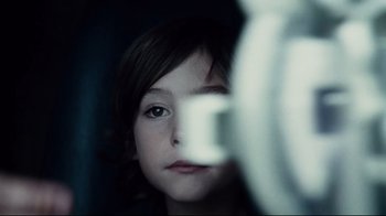 Movie still from “Blindness” (2008), directed by Fernando Meirelles – A little girl looking into a mirror at the reflection of herself in the mirror; Close Up shot, Over the shoulder angle