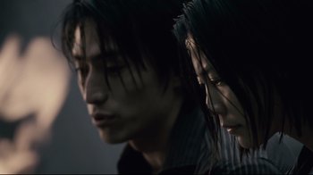 Movie still from “Blindness” (2008), directed by Fernando Meirelles – A man and a woman standing next to each other; Close Up shot, Low angle