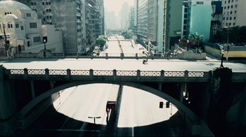 Movie still from “Blindness” (2008), directed by Fernando Meirelles – An aerial view looking down at a city street; Extreme Wide shot, Overhead angle