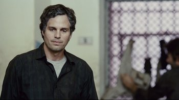 Movie still from “Blindness” (2008), directed by Fernando Meirelles – A person wearing a black shirt; Close Up shot, Over the shoulder angle