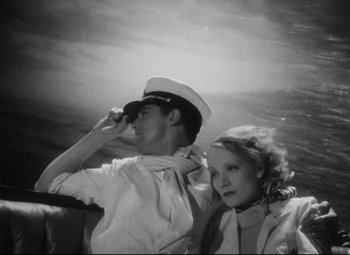Movie still from “Blonde Venus” (1932), directed by Josef von Sternberg – A man and a woman in sailor's uniforms; Medium shot, High angle