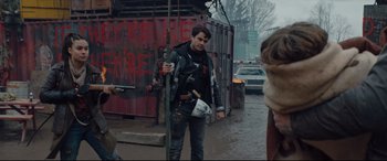 Movie still from “Blood Quantum” (2019), directed by Jeff Barnaby – A young man is walking down the street; Medium shot, Over the shoulder angle