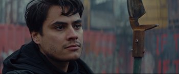 Movie still from “Blood Quantum” (2019), directed by Jeff Barnaby – A person wearing a jacket; Close Up shot, Over the shoulder angle