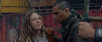 Movie still from “Blood Quantum” (2019), directed by Jeff Barnaby – A man and a woman standing next to each other; Close Up shot, Low angle