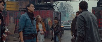 Movie still from “Blood Quantum” (2019), directed by Jeff Barnaby – A group of people standing on the side of a road; Medium shot, Over the shoulder angle