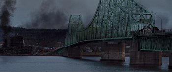 Movie still from “Blood Quantum” (2019), directed by Jeff Barnaby – A large bridge over a body of water; Extreme Wide shot, High angle