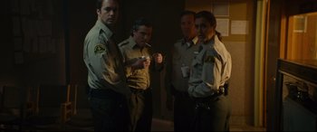 Movie still from “Blood Quantum” (2019), directed by Jeff Barnaby – A group of men and women standing next to each other; Medium shot, Low angle