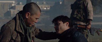 Movie still from “Blood Quantum” (2019), directed by Jeff Barnaby – Two men are fighting in the fog; Close Up shot, Over the shoulder angle