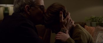 Movie still from “The Amazing Spider-Man” (2012), directed by Marc Webb – A man kissing a woman on the cheek; Close Up shot, Over the shoulder angle