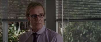 Movie still from “The Amazing Spider-Man” (2012), directed by Marc Webb – A person wearing a shirt and tie; Close Up shot, Over the shoulder angle