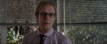 Movie still from “The Amazing Spider-Man” (2012), directed by Marc Webb – A person wearing a shirt and tie; Close Up shot, Over the shoulder angle