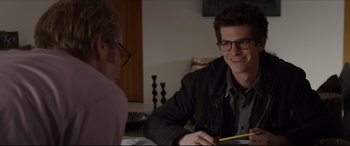 Movie still from “The Amazing Spider-Man” (2012), directed by Marc Webb – A man sitting at a table with a woman; Close Up shot, Over the shoulder angle