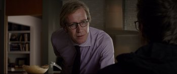 Movie still from “The Amazing Spider-Man” (2012), directed by Marc Webb – A man in a purple dress shirt and a tie; Close Up shot, Over the shoulder angle