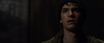 Movie still from “The Amazing Spider-Man” (2012), directed by Marc Webb – A person wearing a hat; Close Up shot, Over the shoulder angle