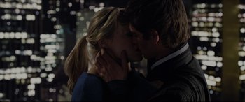 Movie still from “The Amazing Spider-Man” (2012), directed by Marc Webb – A man and a woman kissing each other in the dark; Close Up shot, Over the shoulder angle