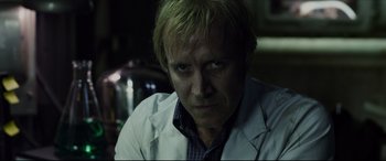 Movie still from “The Amazing Spider-Man” (2012), directed by Marc Webb – A person wearing a lab coat; Close Up shot, Low angle