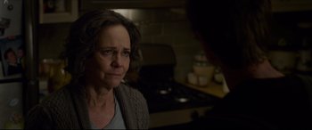 Movie still from “The Amazing Spider-Man” (2012), directed by Marc Webb – An older woman is staring at the camera; Close Up shot, Over the shoulder angle