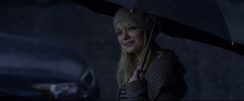 Movie still from “The Amazing Spider-Man” (2012), directed by Marc Webb – A woman holding an umbrella in the rain; Close Up shot, Over the shoulder angle