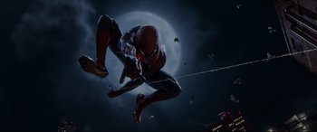 Movie still from “The Amazing Spider-Man” (2012), directed by Marc Webb – A spider - man character flying through the air; Wide shot, Low angle