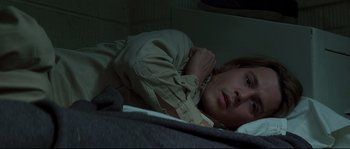 Movie still from “Blow” (2001), directed by Ted Demme – A woman laying in bed with her head resting on a pillow; Close Up shot, High angle