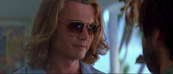 Movie still from “Blow” (2001), directed by Ted Demme – A person wearing sunglasses; Close Up shot, Low angle