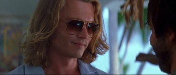 Movie still from “Blow” (2001), directed by Ted Demme – A person wearing sunglasses; Close Up shot, Low angle
