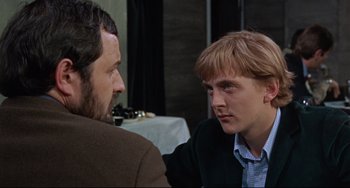 Movie still from “Blow-Up” (1966), directed by Michelangelo Antonioni – A man and a woman talking to each other; Close Up shot, Over the shoulder angle