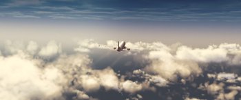 Movie still from “Blue Jasmine” (2013), directed by Woody Allen – An airplane flying in the sky above the clouds; Extreme Wide shot, Overhead angle