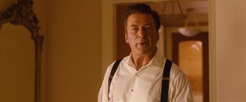 Movie still from “Blue Jasmine” (2013), directed by Woody Allen – A person wearing suspenders; Close Up shot, Low angle