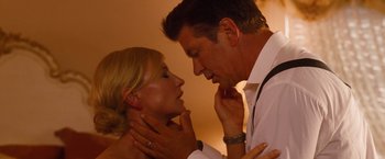 Movie still from “Blue Jasmine” (2013), directed by Woody Allen – A man and a woman are touching their necks together; Close Up shot, Low angle