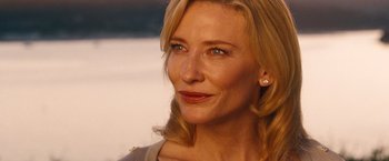 Movie still from “Blue Jasmine” (2013), directed by Woody Allen – A woman with blonde hair and blue eyes; Close Up shot, Over the shoulder angle