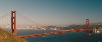 Movie still from “Blue Jasmine” (2013), directed by Woody Allen – A view of the golden gate bridge from a distance; Extreme Wide shot, High angle