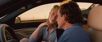 Movie still from “Blue Jasmine” (2013), directed by Woody Allen – A man and a woman sitting in the back of a car; Close Up shot, Over the shoulder angle