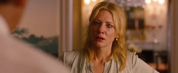 Movie still from “Blue Jasmine” (2013), directed by Woody Allen – A person wearing a white shirt; Close Up shot, Over the shoulder angle