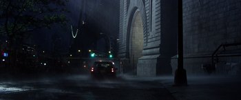 Movie still from “The Amazing Spider-Man 2” (2014), directed by Marc Webb – A car driving down a street at night; Extreme Wide shot, High angle