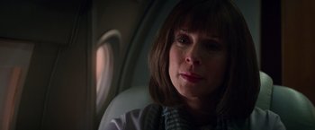 Movie still from “The Amazing Spider-Man 2” (2014), directed by Marc Webb – A person sitting in a chair; Close Up shot, Low angle