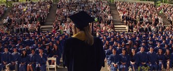 Movie still from “The Amazing Spider-Man 2” (2014), directed by Marc Webb – A group of people sitting in front of a crowd of people; Extreme Wide shot, High angle