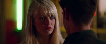 Movie still from “The Amazing Spider-Man 2” (2014), directed by Marc Webb – A woman looking at a man in the mirror; Close Up shot, Over the shoulder angle
