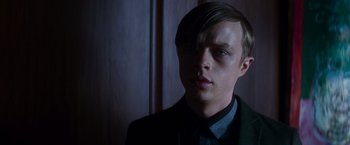 Movie still from “The Amazing Spider-Man 2” (2014), directed by Marc Webb – A young man in a black jacket and a blue shirt; Close Up shot, Over the shoulder angle